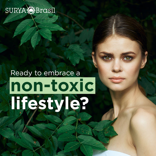 Advertisement for Surya Brasil, featuring a young woman surrounded by lush green foliage with the text "Ready to embrace a non-toxic lifestyle?"