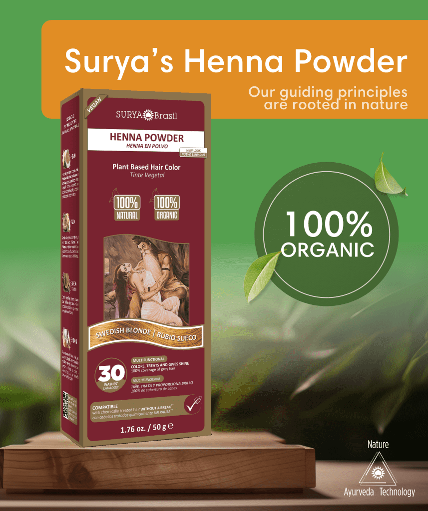 The image displays a box of Surya's Henna Powder in "Swedish Blonde" labeled as "100% Organic" and highlights its plant-based, vegan formula. It offers multifunctional benefits including color, treatment, and shine for up to 30 washes. Set against a backdrop of green leaves, the product emphasizes its natural and organic ethos with the slogan, "Our guiding principles are rooted in nature."