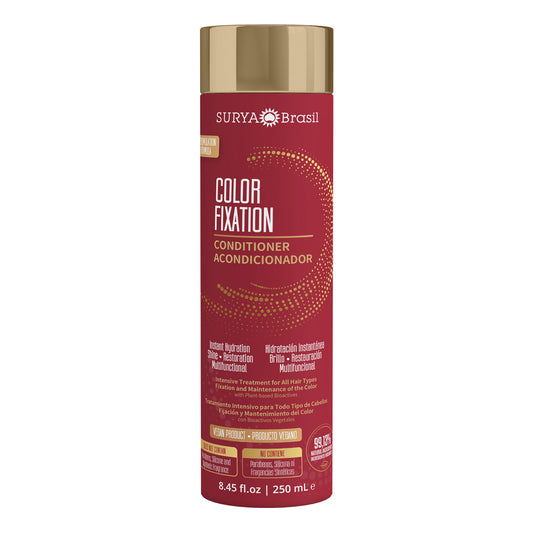 A red bottle of Surya Brasil Color Fixation Restorative Conditioner, enriched with natural actives like Jua and Cupuaçu Butter for vibrant, healthy hair.