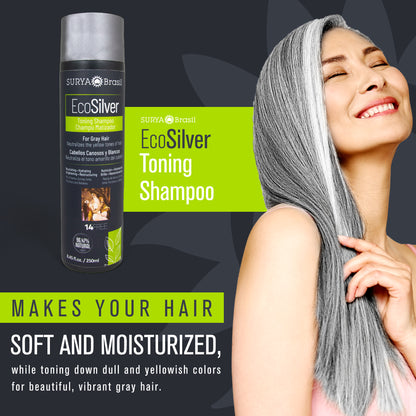 A woman with long gray hair holding a black bottle of EcoSilver Toning Shampoo. Enriched with Henna, Quinoa, Amla, Murumuru, and Babassu for toning and hydration.