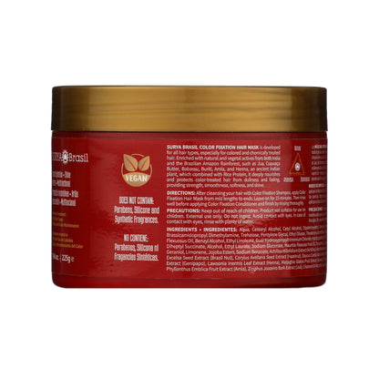 Surya Brasil Color Fixation Hair Mask in a red jar with gold lid; vegan, nourishes color-treated hair with natural botanicals, free from parabens and synthetic fragrances.